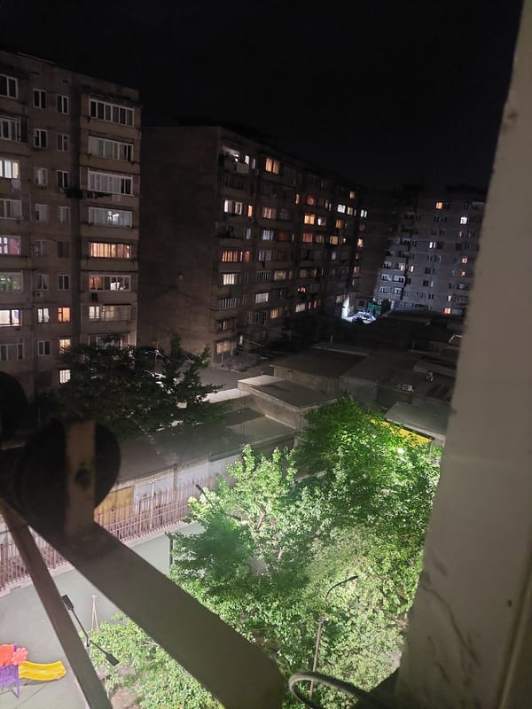 Nighttime urban photography session documents residential Yerevan from above