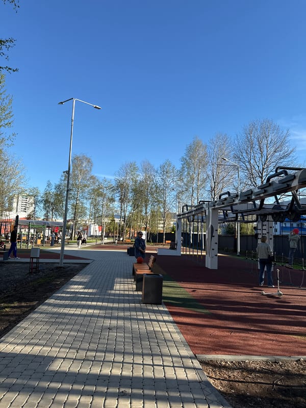 Children play in Tobolsk park during spring afternoon