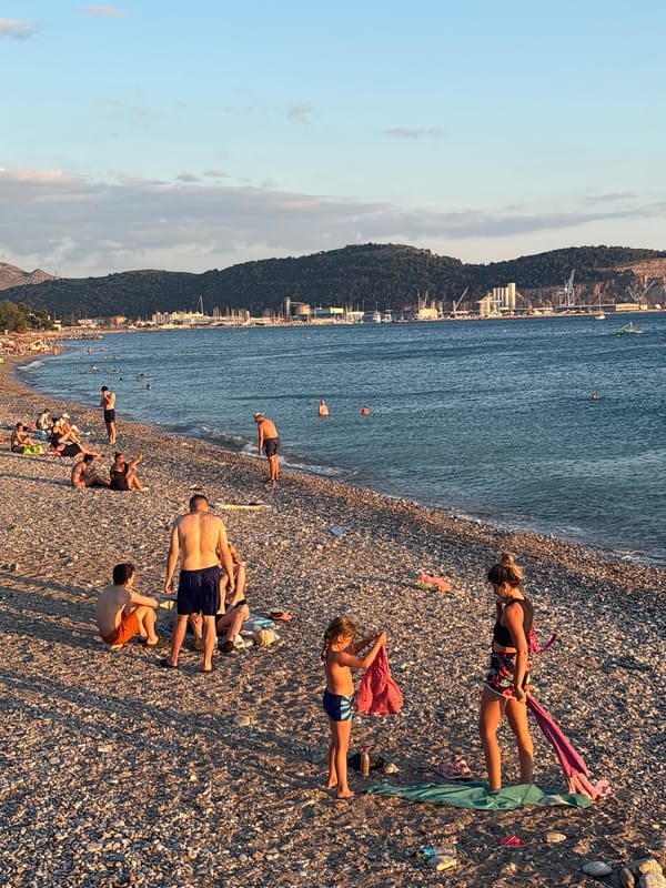 Summer evening on the pebble beach in Bar, Montenegro