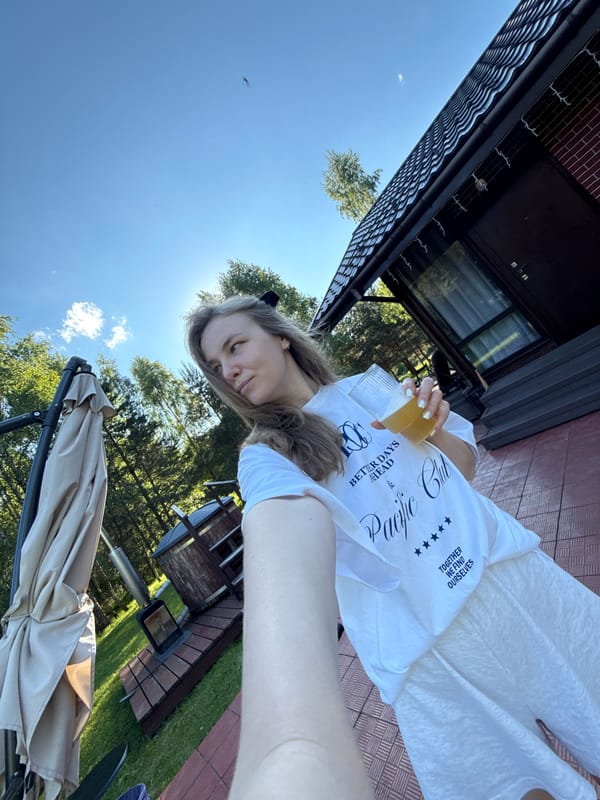 Family enjoys sunny afternoon at rural Russian cabin property