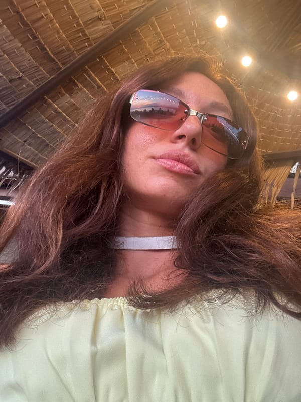 Woman takes selfie in Baan Plai Laem, Thailand