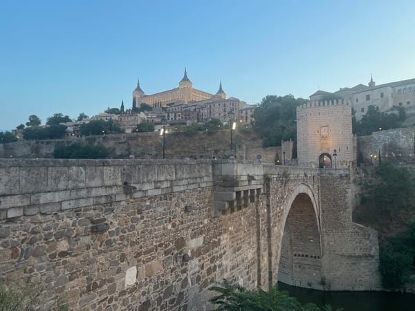 Dusk along the Tagus River at Toledo's medieval bridge