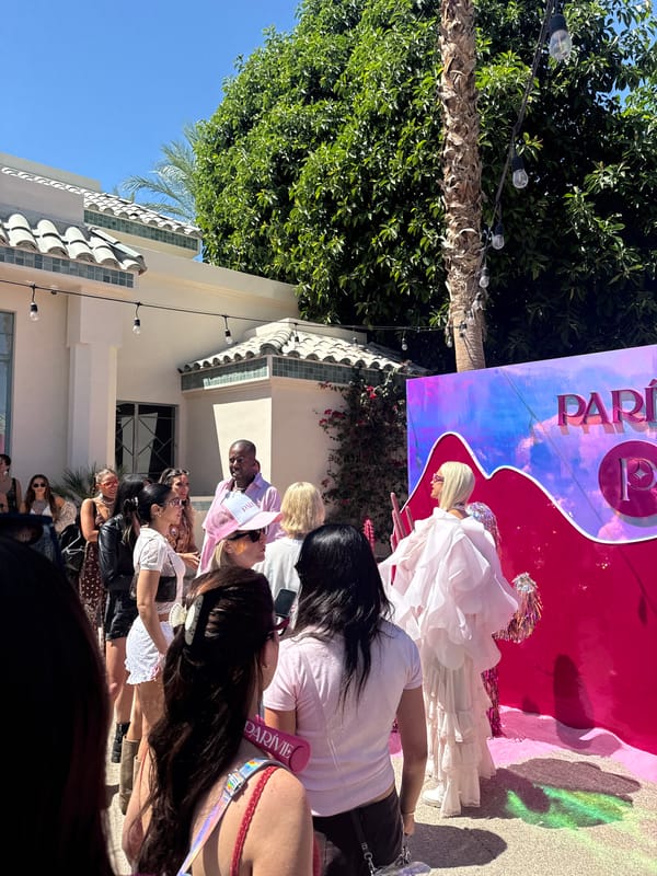 Elaborate pink cocktail with ornate garnishes spotted in La Quinta