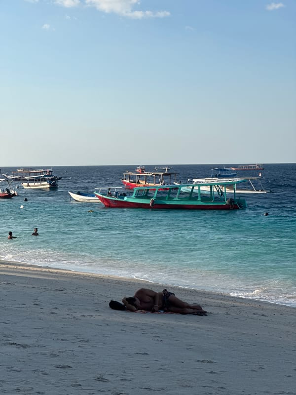 Lazy morning on a Lombok beach, shells and turquoise water
