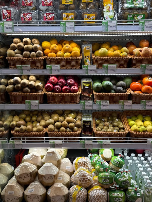 Inside a well-stocked North Kuta supermarket, produce to pastries