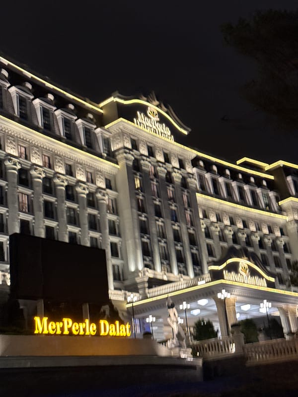 MerPerle Dalat Hotel glowing at night in Da Lat