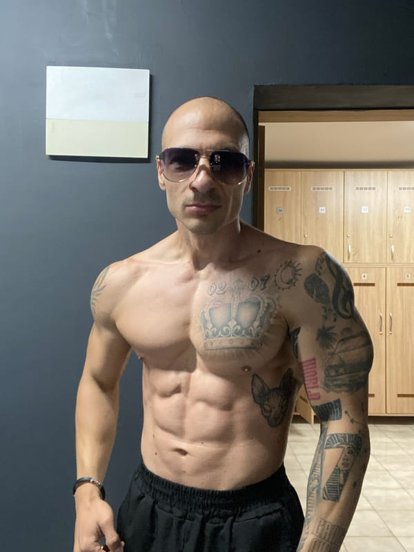 Tattooed man photographed posing in Pleven, Bulgaria