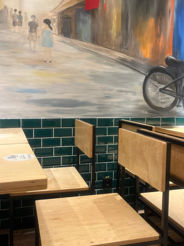 Interior scenes documented in Yerevan featuring mural and coffee packets
