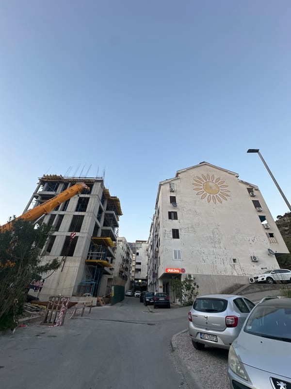 Street scene captured in Budva, Montenegro with mixed architecture