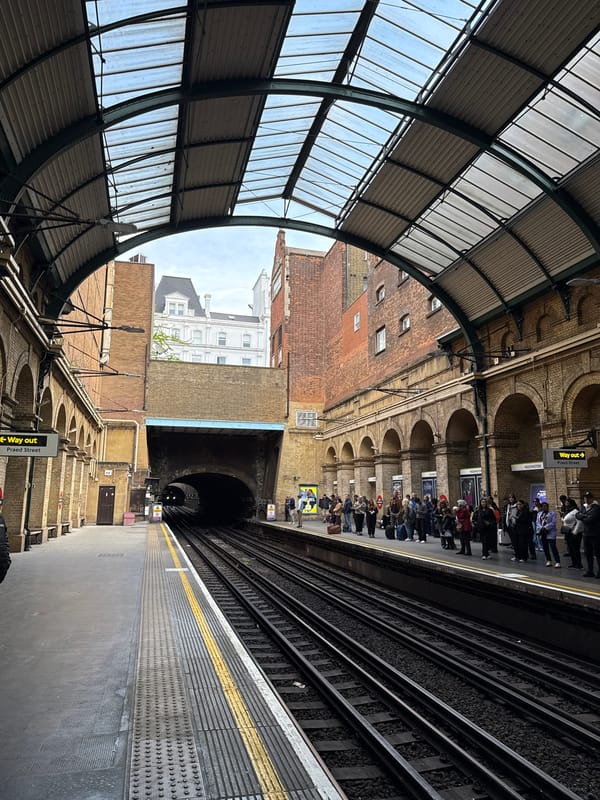Morning commuter activity observed at Paddington Station platforms