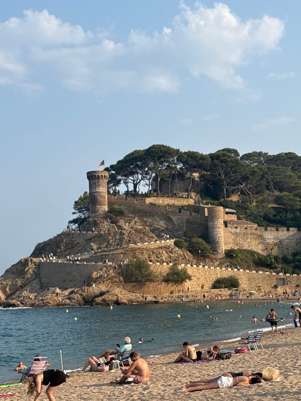 Tossa de Mar beach and Vila Vella castle on a summer afternoon