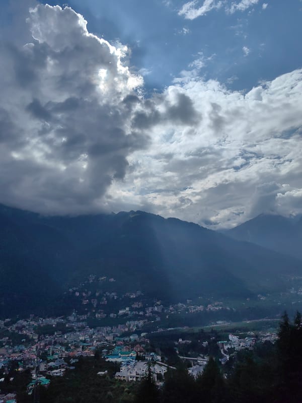 Storm skies, mountain roads, and Royal Enfields around Manali