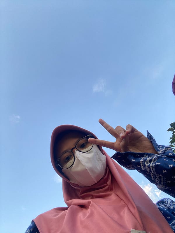 Young women share selfies and mochi treats in Indonesia