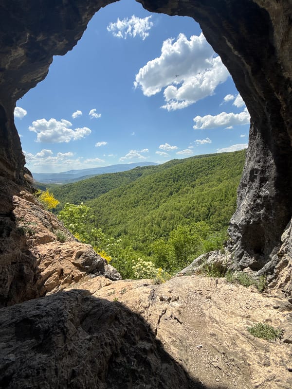 Tourist documents cave visit at Eyes Cave, Bulgaria