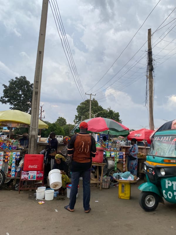 Daily life unfolds across Jos, Nigeria streets and markets