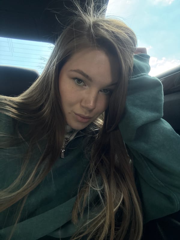 Woman in green hoodie spotted in vehicle near Belgrade