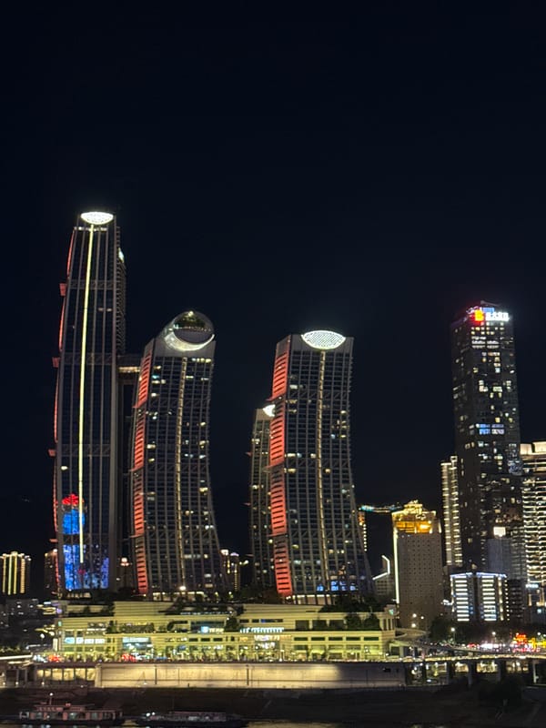 Chongqing's Jiangbeicheng waterfront glows on a summer night