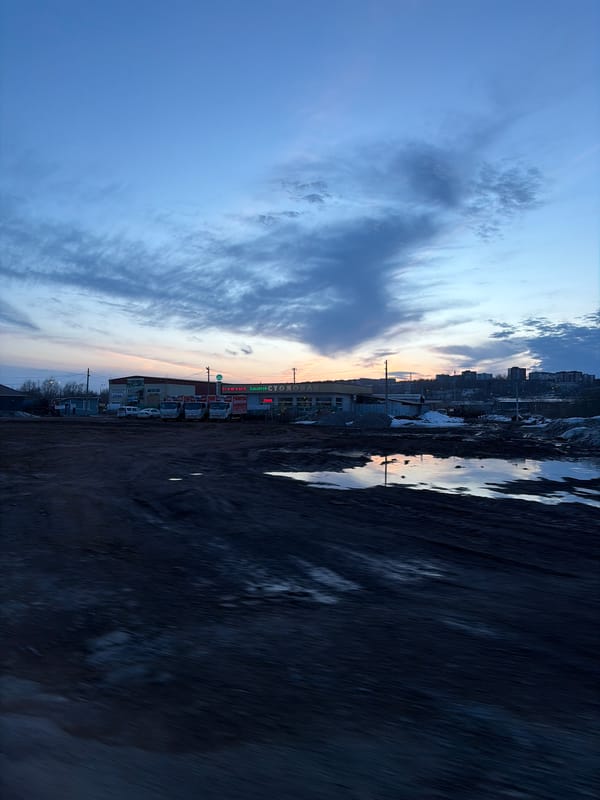 Street scene captured during twilight hours in Votkinsk, Russia