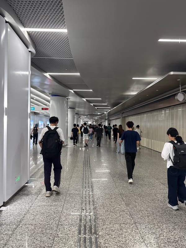 Rainy evening commute through Tianhe's streets and subway