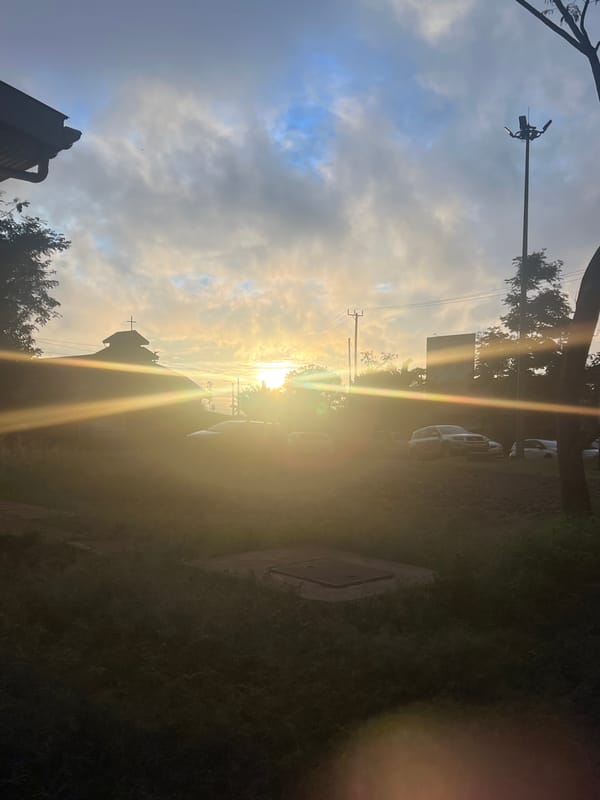 Bright sunlight silhouettes church in daytime Nairobi scene