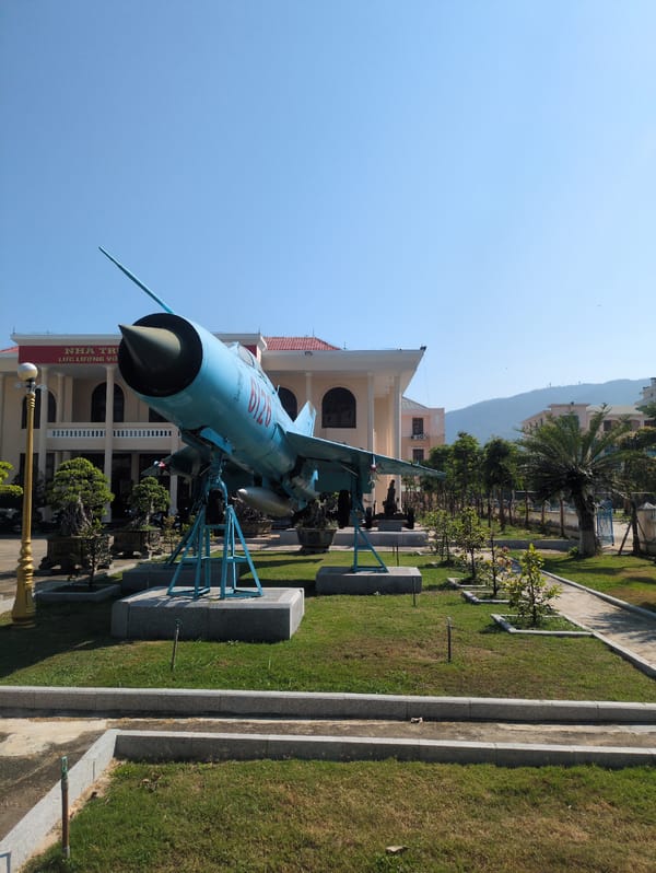 Street scenes and MiG-21 display documented in Quy Nhon