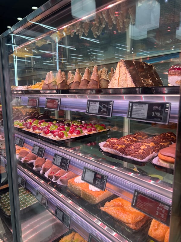 Shopper documents supermarket displays and architectural lighting fixtures