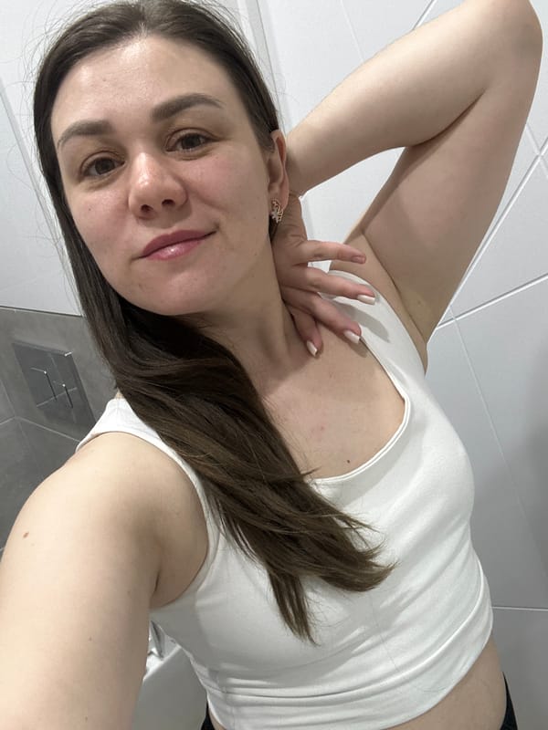 Woman takes selfies in bathroom in Chaikovsky, Russia