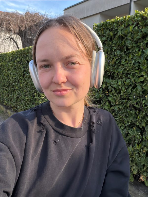 Colorful buildings with climbing plants observed in Erba, Italy