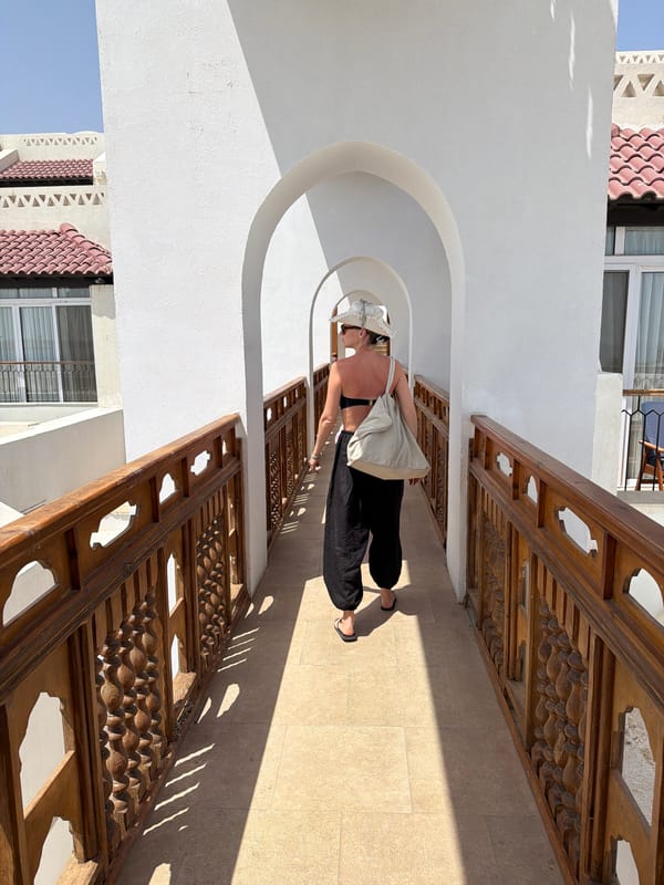 Woman walks resort corridor in Sharm El Sheikh