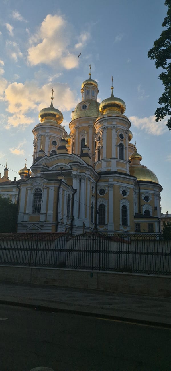 Golden domes and street life in central Saint Petersburg