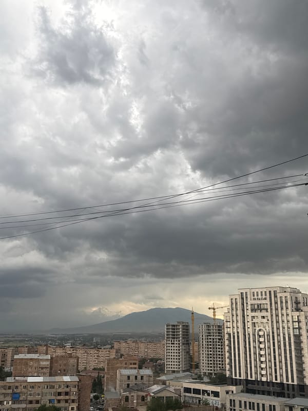 Abovyan under heavy skies: apartments, cranes, and mountain views
