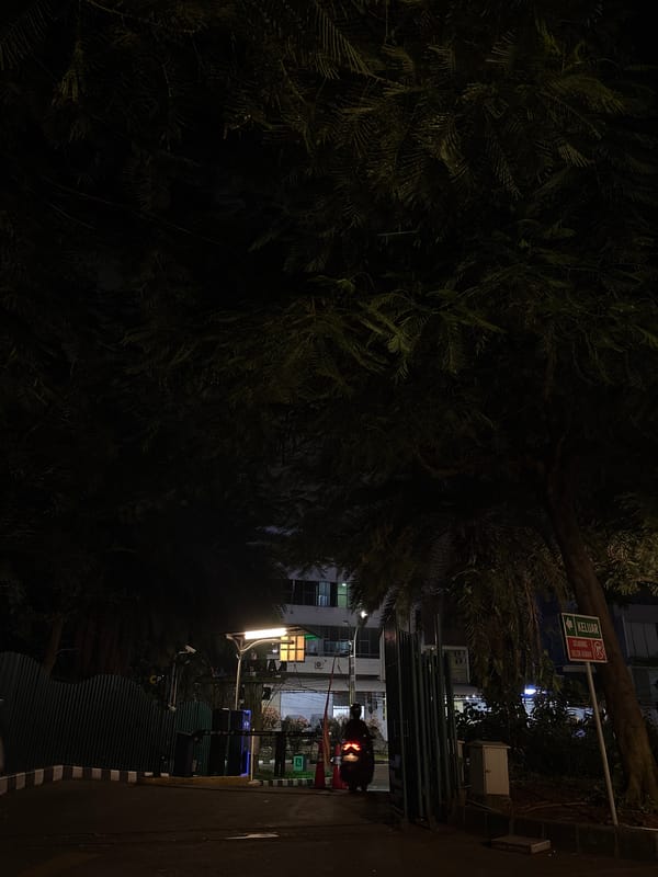 Evening walk documented through illuminated North Jakarta streets