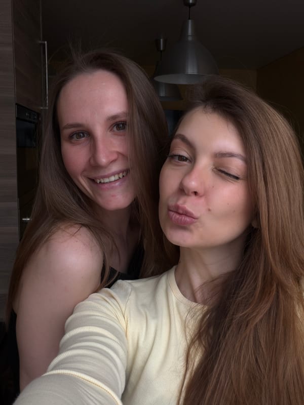 Women share selfies during casual meal gathering in Putilkovo