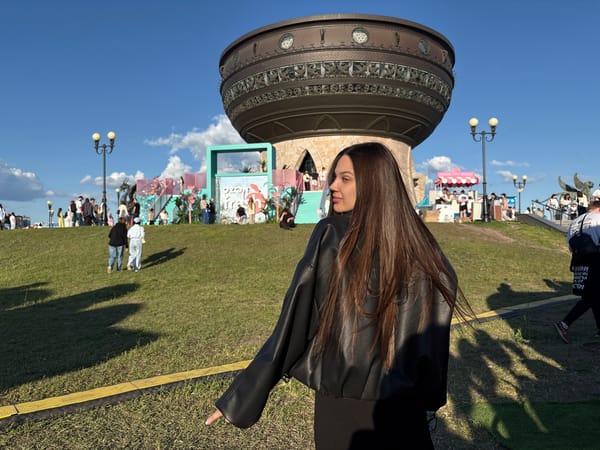 Woman takes selfie at Kazan Wedding Palace mirror