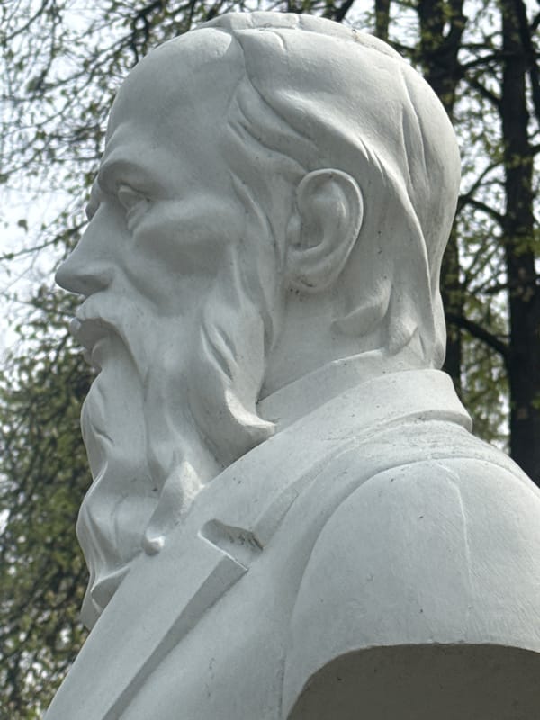 Marble statue of formal-dressed man documented in Yekaterinburg