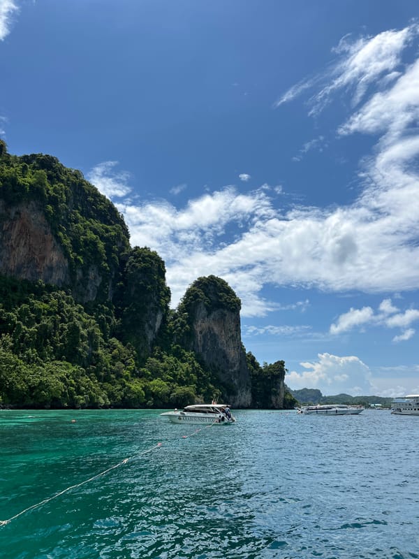 Morning water activities around Ao Nang limestone cliffs and islands