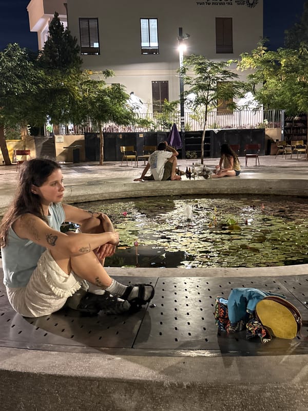 Chill afternoon scenes at a Tel Aviv park with dogs