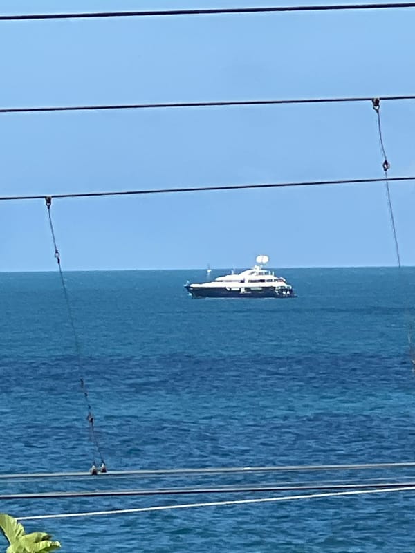 Luxury yacht and docked boat on the Black Sea near Sochi