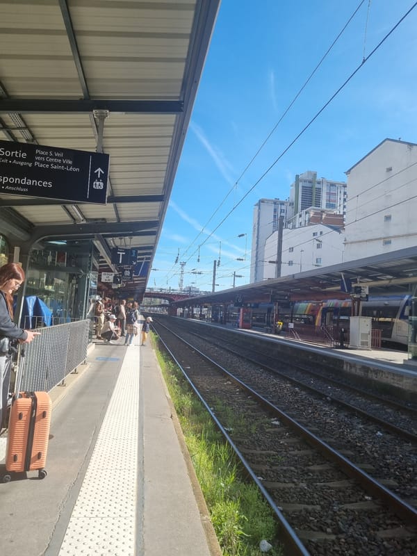 Passengers wait on train platform in Nancy, France
