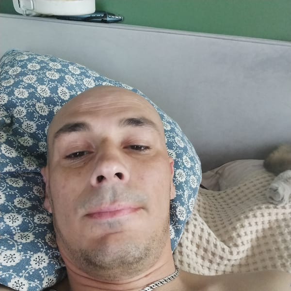 Lazy morning in bed with a cat, Vladivostok