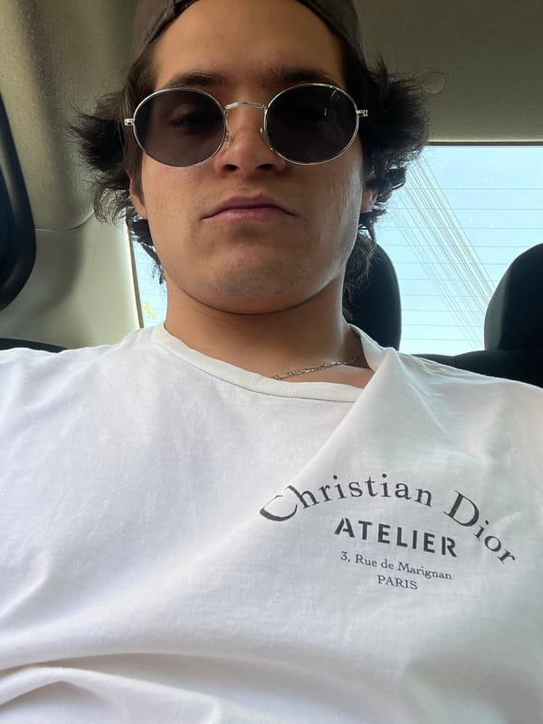 Young man photographed in vehicle interior, Mexico City