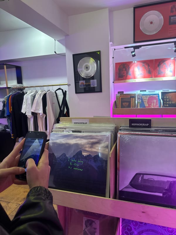 Vinyl record browsing documented at Yerevan music store