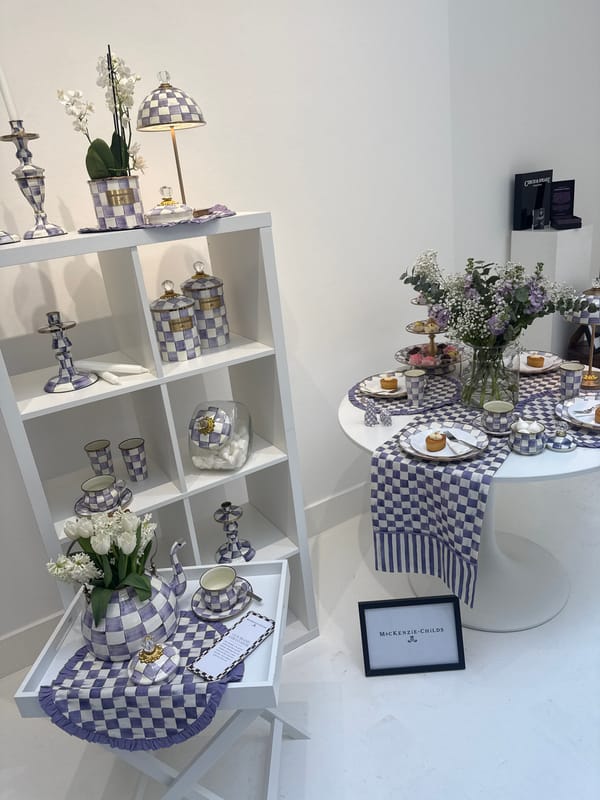 Purple checkered homeware display documented at London retail showroom
