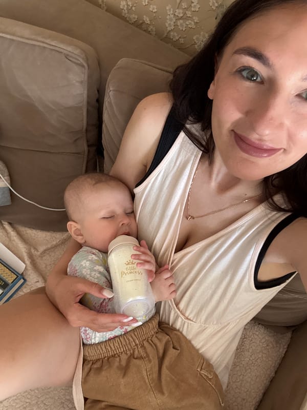 Infant sleeps peacefully with dog companion in Sochi nursery