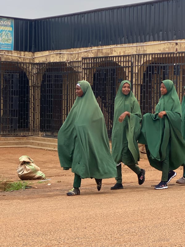 Midday street and market life in Barakin, Nigeria
