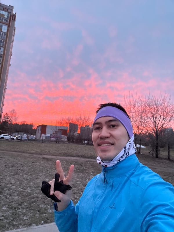 Person poses for peace sign selfie in Chistoe Ozero