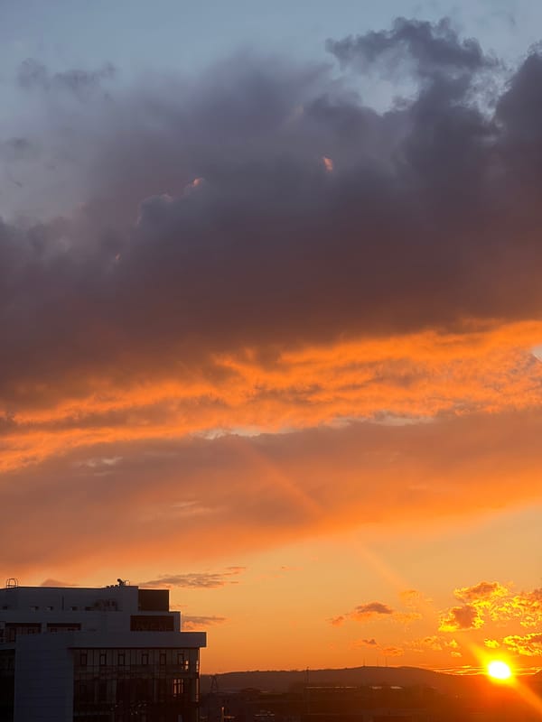 Sunset captured through clouds in Krasnoyarsk, Russia