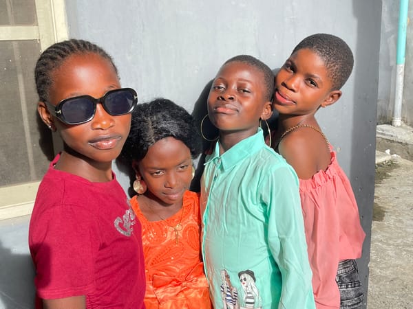 Young women pose for outdoor photoshoot in Badagry, Nigeria