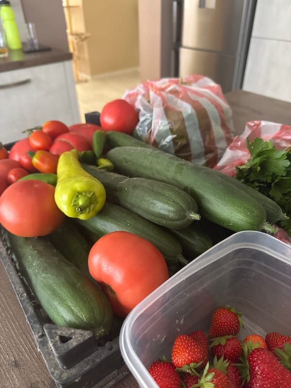 Fresh produce and a city twilight, same afternoon