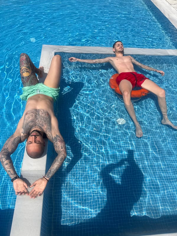 Poolside leisure captured with swimmers and relaxing dog in Lefkada